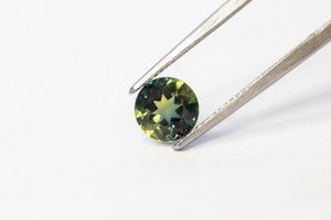 6.11mm 1.08 carat Round-Cut Green-Blue Parti Sapphire