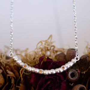 Annui Necklace - Silver with Garnets